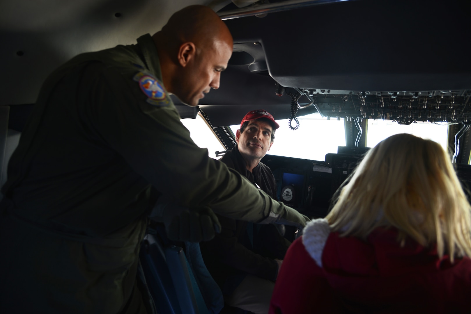 Lt. Col. Chris Jones, 68th Airlift Squadron, pilot gives a tour of the C-5M Super Galaxy, at the Abbotsford International Airport in Abbotsford British Columbia, Canada. The airport celebrated a week of International Women’s Day, March 10-11, 2018, during the “Sky’s the limit-Girls fly too” Airshow.  Jones, discussed the aircraft’s latest upgrades, which provides the aircraft with more capability, reliability, and affordability. (U.S. Air Force photo by Ms. Minnie Jones)