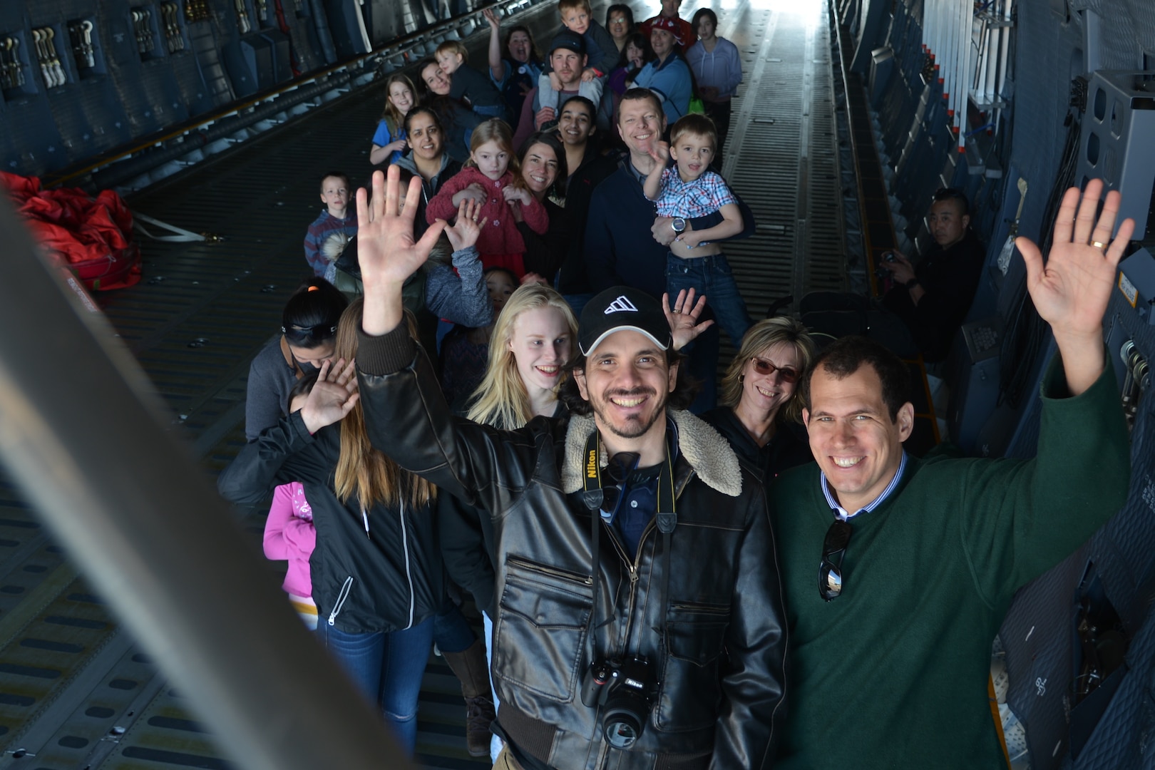 Visitors attending the Abbotsford International Airport in Abbotsford British Columbia, Canada, wait in line for a tour of the upper-deck of the C-5M Super Galaxy aircraft. The airport celebrated a week of International Women’s Day, March 10-11, 2018, during the “Sky’s the limit-Girls fly too” Airshow.  (U.S. Air Force photo by Ms. Minnie Jones)