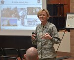 Air Force Brig. Gen. Heather Pringle, commanding general, 502nd Air Base Wing and Joint Base San Antonio, speaks to the audience during the Brooke Army Medical Center Women's History Month observance March 12 in the Medical Mall. The event honored women who fight all forms of discrimination.