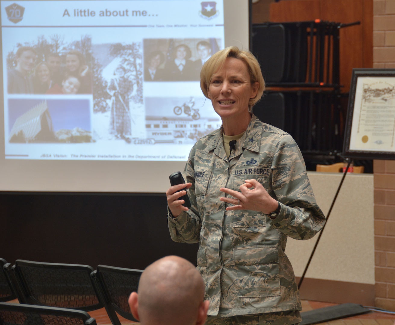 Air Force Brig. Gen. Heather Pringle, commanding general, 502nd Air Base Wing and Joint Base San Antonio, speaks to the audience during the Brooke Army Medical Center Women's History Month observance March 12 in the Medical Mall. The event honored women who fight all forms of discrimination.