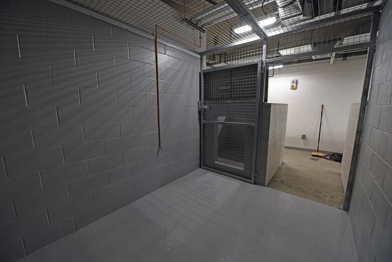 Each canine now has an 8-by-10 foot kennel and 4-by-4 foot dog house, increasing the overall square footage of living space from 24 square feet to nearly 100 square feet. A watering system was also built into the kennel, providing the canines with 24/7 access to fresh water. (U.S. Air Force photo/Senior Airman Mackenzie Richardson)