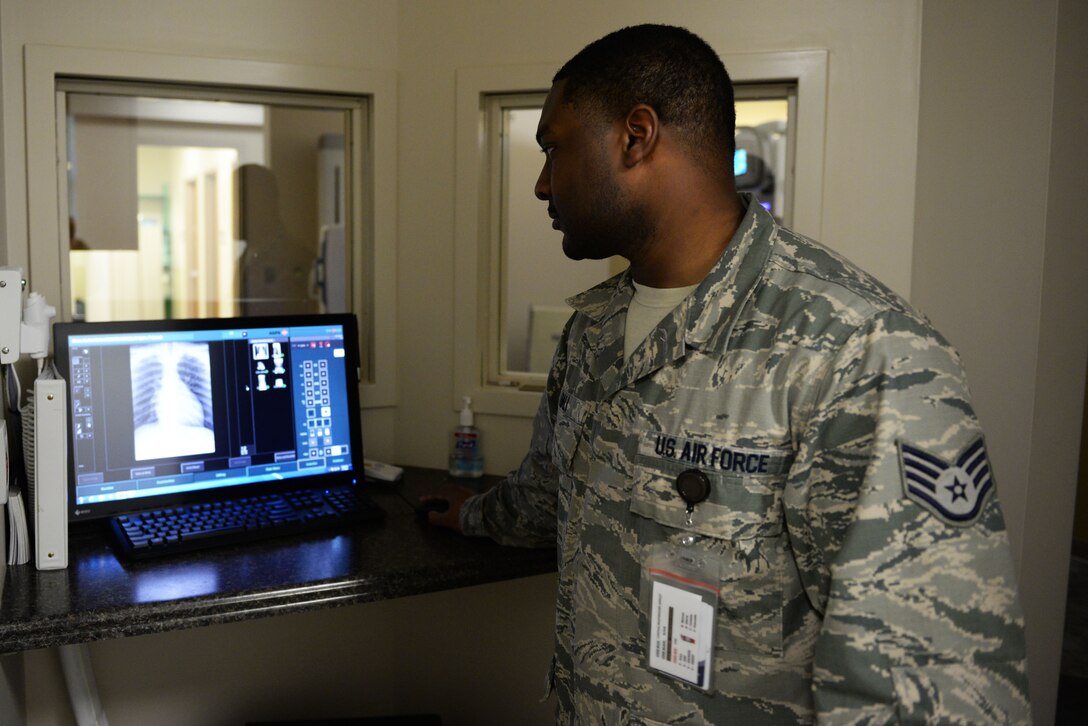 U.S. Air Force Staff Sgt. William Ball, 20th Medical Support Squadron radiology technologist examines an x-ray to ensure it was taken properly at Shaw Air Force Base, S.C., March 7, 2018.