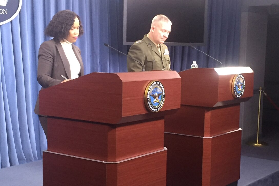 Chief Pentagon spokesperson Dana W. White and Marine Corps Lt. Gen. Kenneth M. McKenzie Jr., the Joint Staff director, answer reporters’ questions during a news conference at the Pentagon.