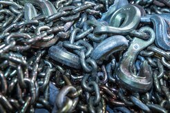 Chains rest on a pallet during a mobility exercise at the Joint Mobility Center at Joint Base Elmendorf-Richardson, Alaska, March 9, 2018. Mobility exercises are designed to bridge the gap between semi-annual POLAR FORCE exercises. They enhance readiness and training, while providing teachable moments to augmentees tasked to support cargo-processing.