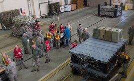 Airmen assigned to the 673d Logistics Readiness Group participate in a mobility exercise at the Joint Mobility Center at Joint Base Elmendorf-Richardson, Alaska, March 9, 2018. Mobility exercises are designed to bridge the gap between semi-annual POLAR FORCE exercises. They enhance readiness and training, while providing teachable moments to augmentees tasked to support cargo-processing.