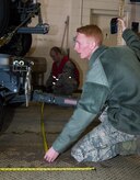 Senior Airman Michael Berzel, 773d Logistics Readiness Squadron, takes measurements of a trailer during a mobility exercise at Joint Base Elmendorf-Richardson, Alaska, March 9, 2018. Mobility exercises are designed to bridge the gap between semi-annual POLAR FORCE exercises. They enhance readiness and training, while providing teachable moments to augmentees tasked to support cargo-processing.