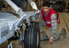 Airman 1st Class Michael Breeding, 773d Logistics Readiness Squadron, takes measurements of a trailer during a mobility exercise at Joint Base Elmendorf-Richardson, Alaska, March 9, 2018. Mobility exercises are designed to bridge the gap between semi-annual POLAR FORCE exercises. They enhance readiness and training, while providing teachable moments to augmentees tasked to support cargo-processing.