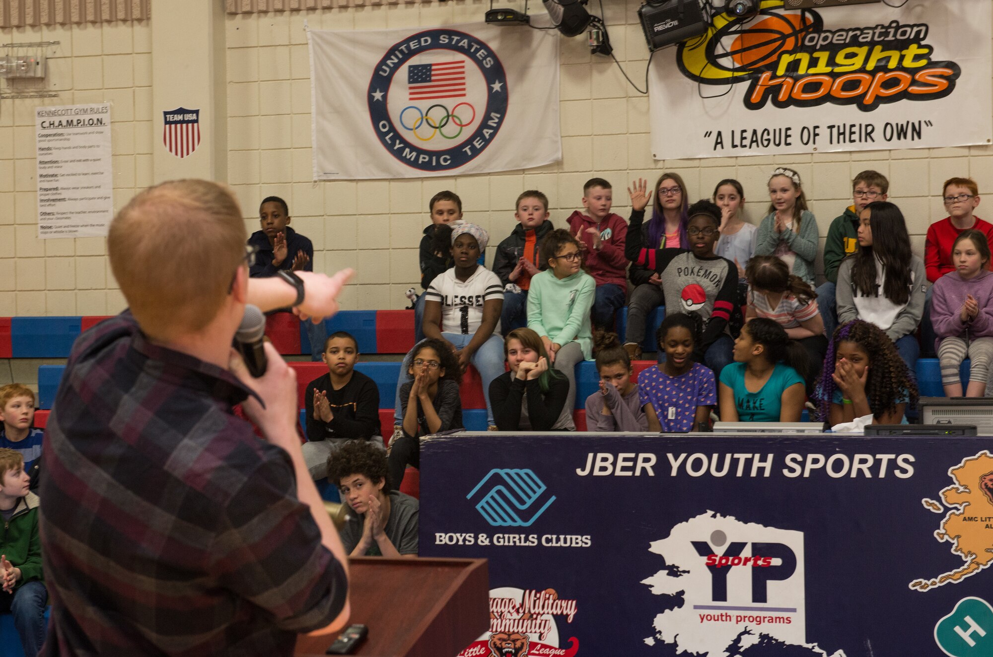Jon Peterson speaks to children about the power of education at the Kennecott Youth Center at Joint Base Elmendorf-Richardson, Alaska, March 7, 2018. Jon was recognized as this year’s Boys and Girls Clubs of America Military Youth of the Year for the state of Alaska and awarded a $5,000 scholarship. The program is designed to promote service to club, community and family, academic success, strong moral character, life goals and poise and public speaking. Jon will now compete at the Pacific Air Forces regional level for a chance to win a $40,000 scholarship and an invitation to compete at the national level.