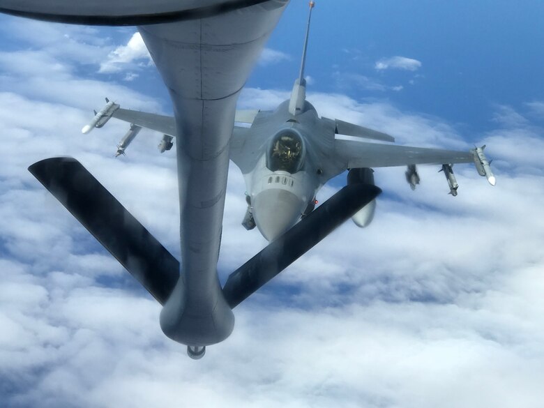 The 14th Fighter Squadron conducts refueling operations over the Pacific Ocean.