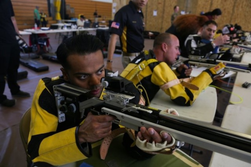 Recuperating Soldier fires air rifle in training