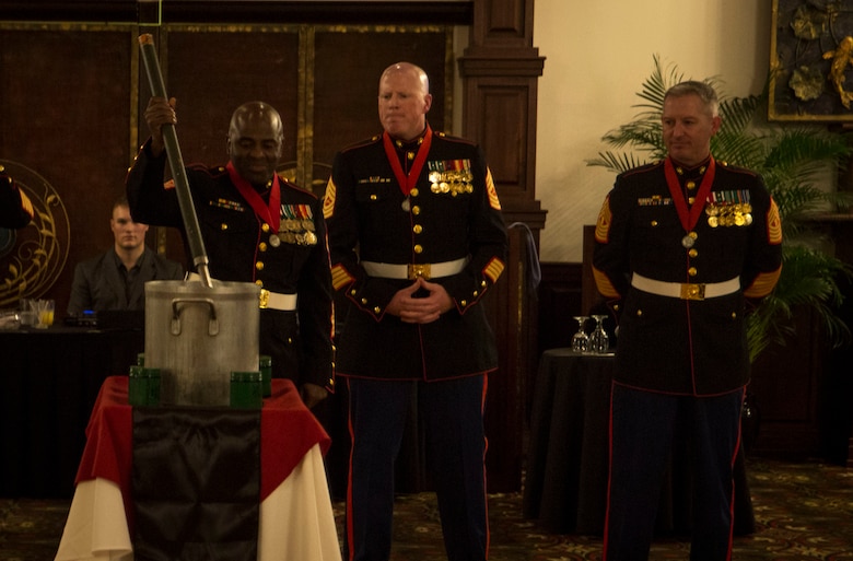 Master Gunnery Sgt. Lamar Burris stirs the ceremonial grog during the St. Barbara’s Day celebration, March 9, 2017. The Honorable Order of St. Barbara recognizes Marines for their accomplishments in the artillery occupation by awarding them the St. Barbara’s Medallion. Burris, a native of Gastonia, North Carolina, is with 3rd Battalion, 12th Marine Regiment, 3rd Marine Division.