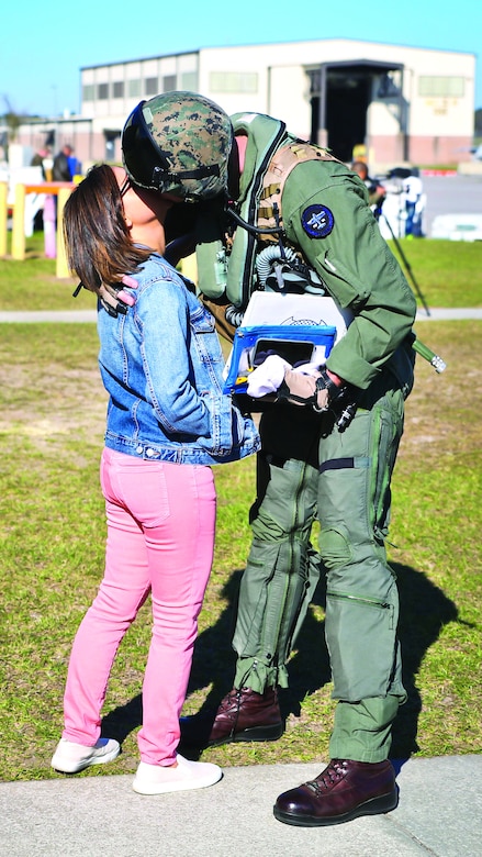 A Marine says goodbye to a loved one before leaving for a deployment aboard Marine Corps Air Station Beaufort, March 9.