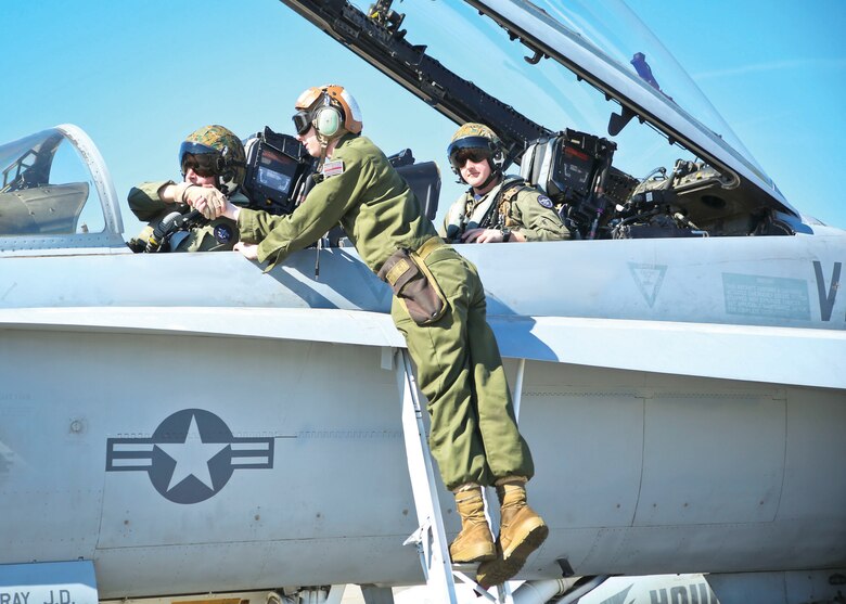 A pilot says goodbye to a maintainer before departing Marine Corps Air Station Beaufort March 9.