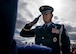 Tech. Sgt. John Shortell III salutes the flag of the late Lt. Col. Camilo Guerrero moments before it was presented to Guerrero's wife March 12, 2018, at the United States Air Force Academy, Colo. Guerrero served 21 years in the Air Force and passed away March 6, 2018, after a two-year battle with cancer. (U.S. Air Force photo by Tech. Sgt. David Salanitri)