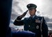 Tech. Sgt. John Shortell III salutes the flag of the late Lt. Col. Camilo Guerrero moments before it was presented to Guerrero's wife March 12, 2018, at the United States Air Force Academy, Colo. Guerrero served 21 years in the Air Force and passed away March 6, 2018, after a two-year battle with cancer. (U.S. Air Force photo by Tech. Sgt. David Salanitri)