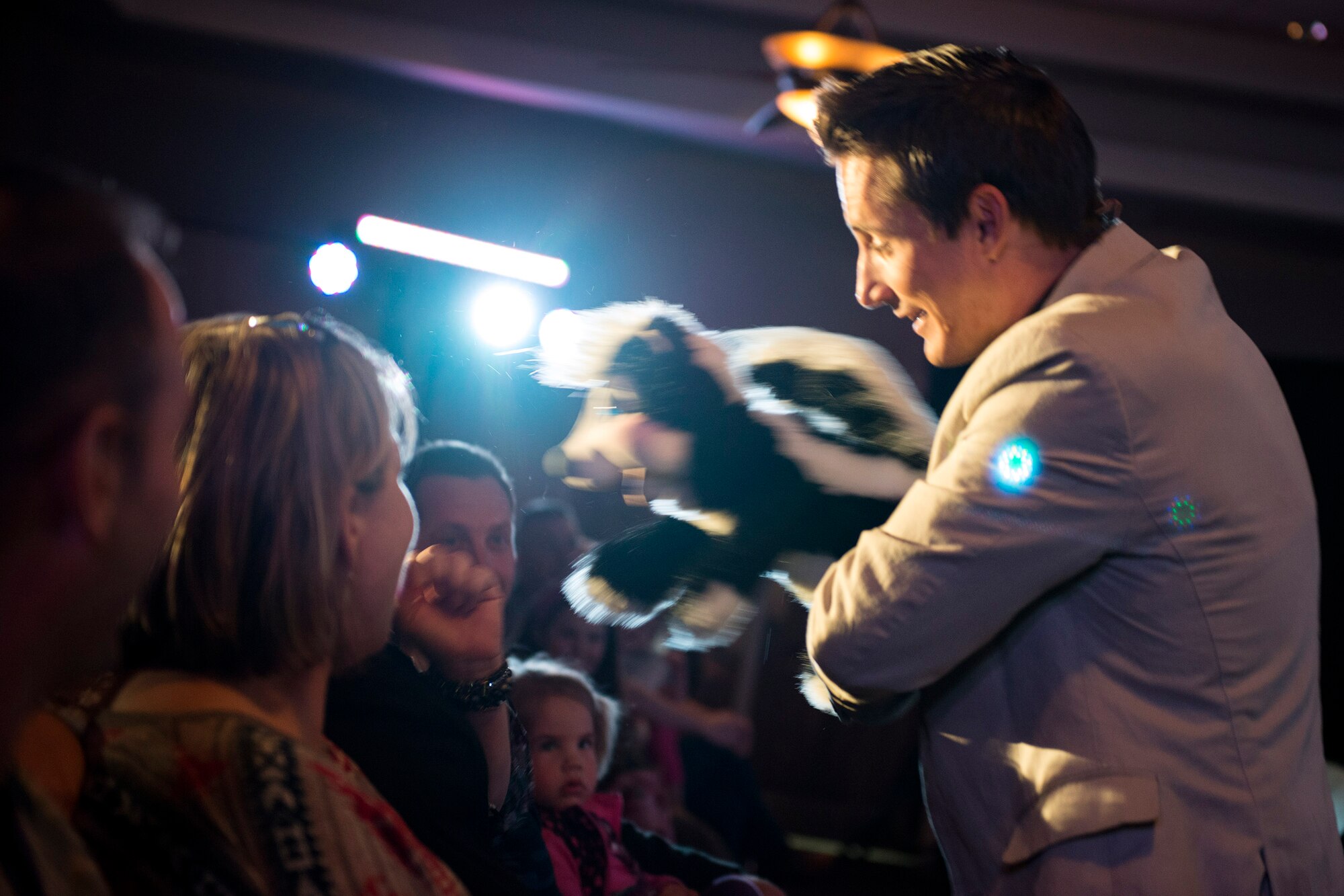 Ryan Bomgardner, ventriloquist, performs a skit with ‘Ardy the Skunk’ for the audience during his comedy show, March 15, 2018, at Moody Air Force Base, Ga. Air Force Entertainment provided this opportunity for Airmen to attend as a family to enjoy some time away from the mission. Bomgardner is a full-time ventriloquist and comedian who performs over 140 shows annually throughout North America. (U.S. Air Force photo by Airman 1st Class Erick Requadt)