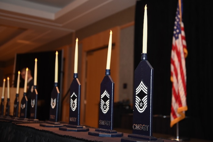Nine candles representing the nine ranks of the enlisted Air Force stand center stage during the Hill Air Force Base Chief Master Sergeant Recognition Ceremony held March 10, 2018, at the Ogden Eccles Conference Center. (U.S. Air Force photo by Cynthia Griggs)