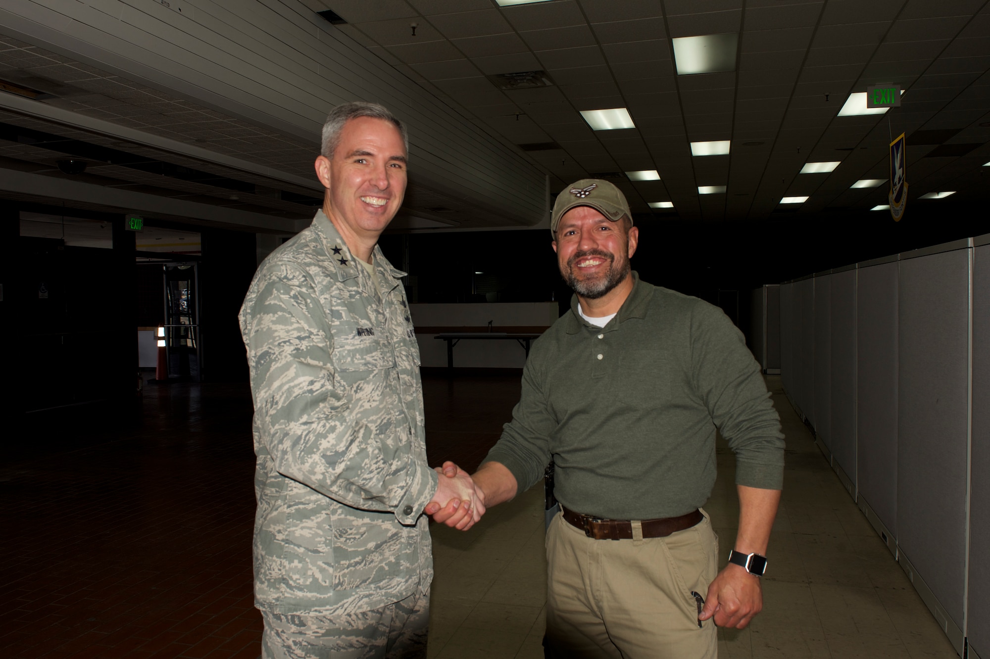 PETERSON AIR FORCE BASE, Colo. – Maj. Gen. Stephen Whiting, 14th Air Force commander, toured the 21st Security Forces Squadron Training Center at Peterson Air Force Base, Colo., March 14, 2018. Whiting coined Isaac Lopez, 21 SFS unit trainer, for his service to the Air Force and presentation of the training center. (U.S. Air Force photo by Cameron Hunt)