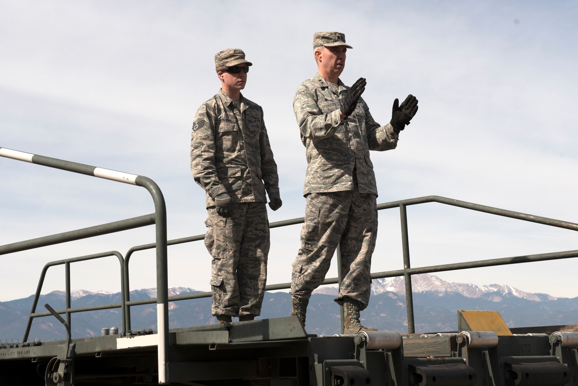 PETERSON AIR FORCE BASE, Colo. – Maj. Gen. Stephen Whiting, 14th Air Force commander, toured the 21st Logistics Readiness Squadron Peterson Air Force Base Colo., March 14, 2018. Whiting participated in securing freight for aircraft loading. (U.S. Air Force photo by Cameron Hunt)