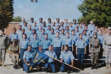 U.S. Army Reserve Sgt. Maribel Cano-Meraz, third row, right, then 17, pauses for a group photo with her group after graduating Lincoln’s Challenge Academy, 2007.