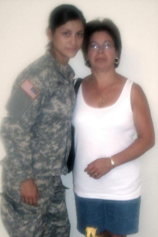 U.S. Army Reserve Sgt. Maribel Cano-Meraz, pauses for a photo with her mother after graduating Army Basic Combat Training. Cano-Meraz is a first-generation born U.S. citizen, of Mexican descent, who grew up in Chicago in the communities of Hermosa and Humboldt Park.