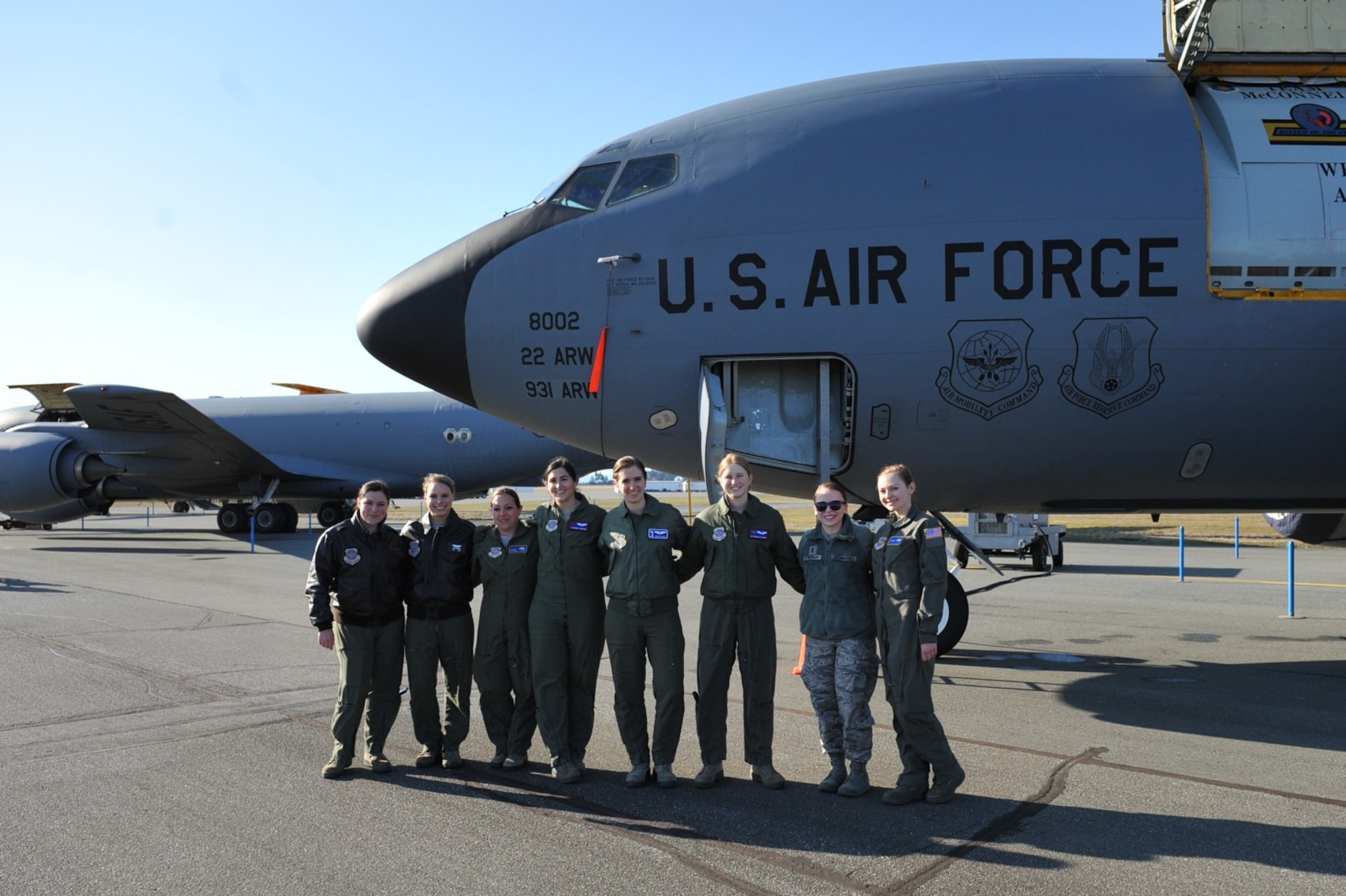 The all-female crew poses by the static display prior to the Girls Fly Too event March 11-12, at Abbotsford International Airport, Abbotsford, British Columbia, Canada. While there were many participants at the air show, the 22nd Air Refueling Wing was the only display with an all-female crew.