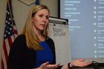 Tara Mercado, 22nd Air Force process manager, briefs during the 22nd Air Force Senior Leader Summit March 14, 2018 at Dobbins Air Reserve Base, Georgia.