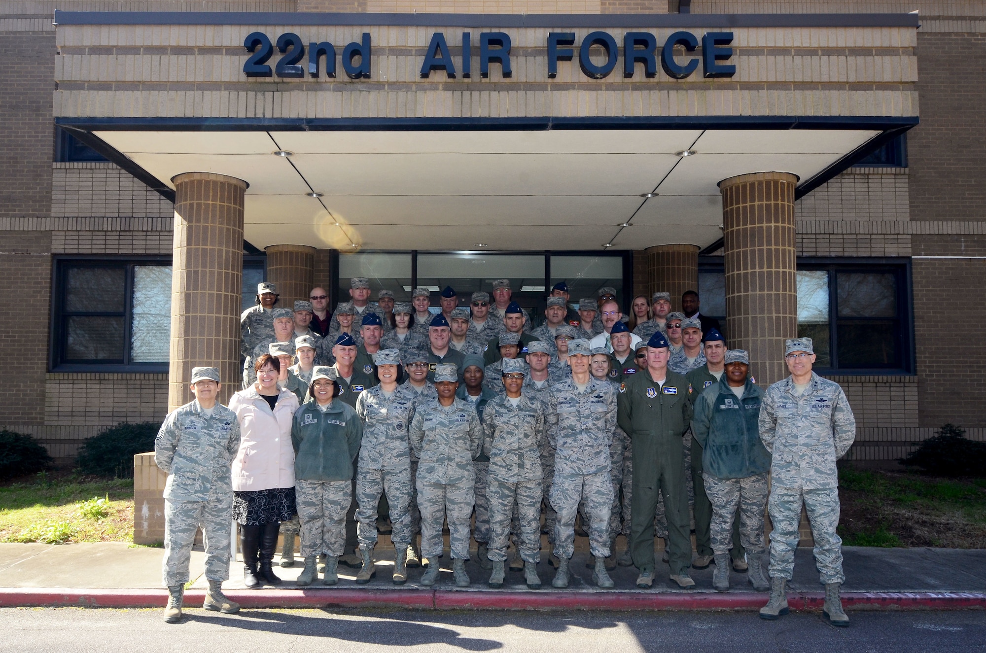 Twenty-second Air Force Senior Leader Summit attendees pose in front of the Numbered Air Force headquarters March 15, 2018 at Dobbins Air Reserve Base, Georgia.