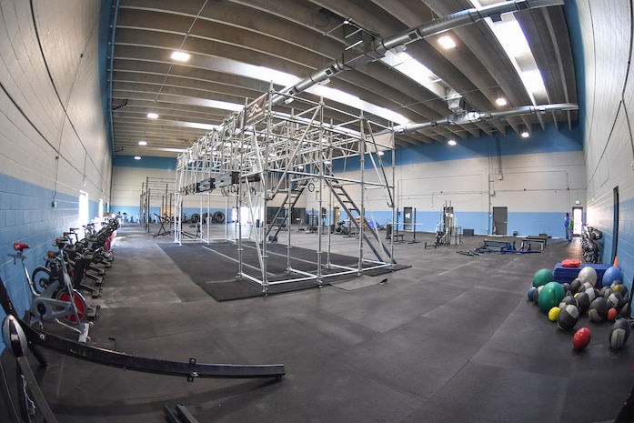 The functional training room previously located in a special area called The Bubble is now located inside the Hess Fitness Center. A ribbon cutting ceremony will be held on March 27 at 11 a.m. The new area houses rowing machines, spin bikes,TRX suspension training equipment, an Alpha Warrior obstacle course, weights, and other CrossFit equipment. (U.S. Air Force photo by Cynthia Griggs)