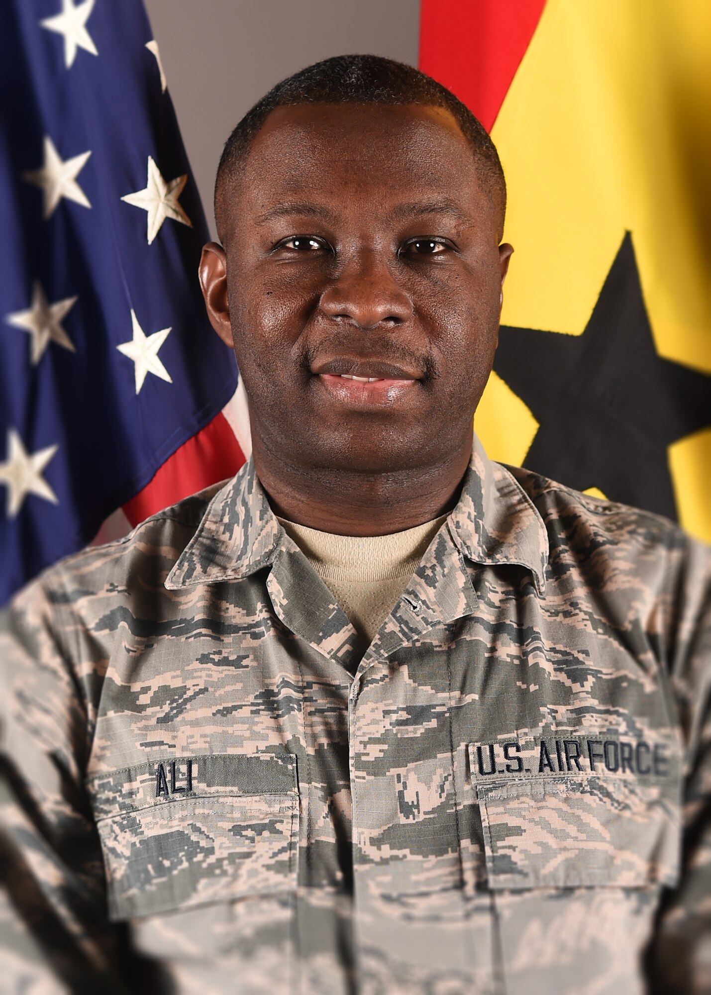 Airman 1st Class Maxwell Ali, an aerospace technician for the 319th Medical Operations Support Squadron, poses for a portrait on Grand Forks Air Force Base, N.D., March. 13, 2018. Ali was born and raised in Ghana, a country in West Africa. (U.S. Air Force photo by Airman 1st Class Melody Wolff)