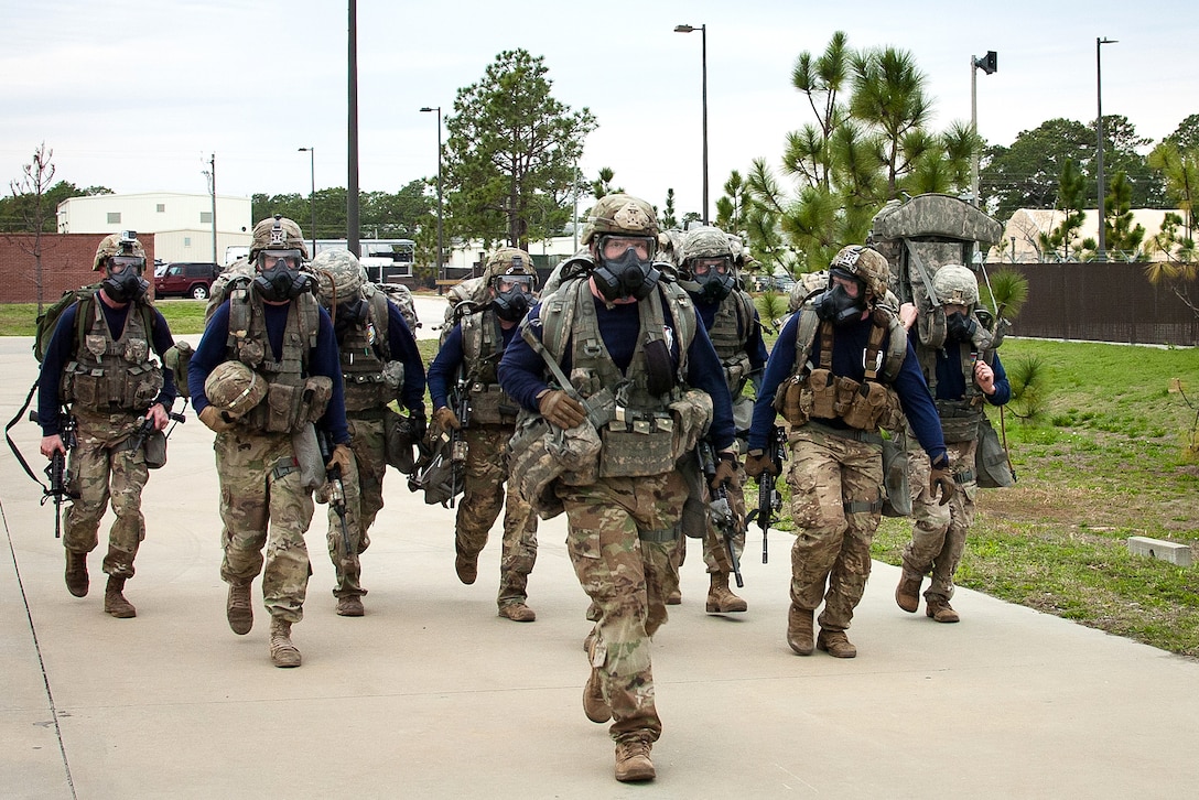 Soldiers march to their next task.