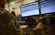 Staff Sgt. Josiah McDonald (left), 455th Expeditionary Logistic Readiness Squadron in-bound cargo NCOIC, logs hazardous material information into their database Mar. 16, 2018 at Bagram Airfield, Afghanistan.