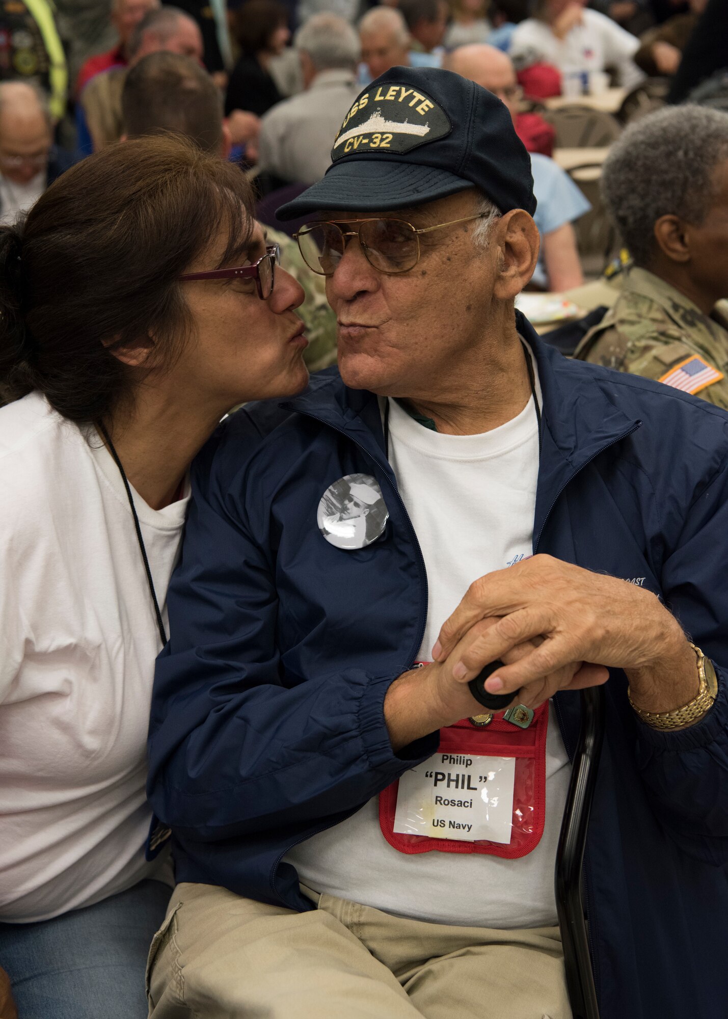 Phillip "Phil" Rosaci, United States Navy veteran, celebrates during the Honor Flight ceremony, March 17, 2018 at Wickham Park Senior Center in Melbourne, Fla. Rosaci served as a Deck Hand on the USS Leyte and turns 87 years old this March.