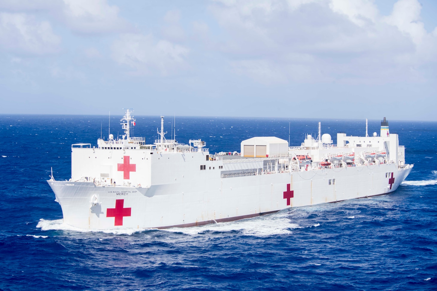 PACIFIC OCEAN (March 16, 2018) Military Sealift Command hospital ship USNS Mercy (T-AH 19) transits the waters near Guam en route for Pacific Partnership 2018 (PP18). PP18's mission is to work collectively with host and partner nations to enhance regional interoperability and disaster response capabilities, increase stability and security in the region, and foster new and enduring friendships across the Indo-Pacific Region.