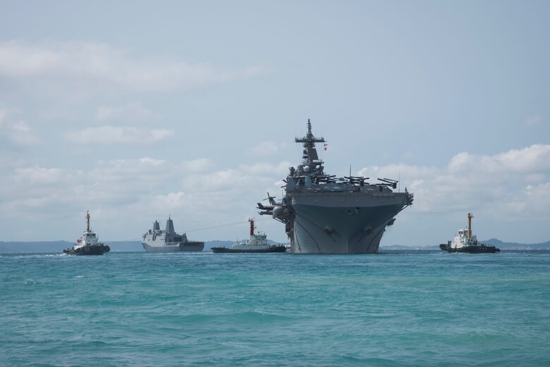 180319-N-YG104-0028 OKINAWA, Japan (March 19, 2018) The amphibious assault ship USS Wasp (LHD 1) departs the harbor at White Beach Naval Facility. Wasp, with embarked 31st Marine Expeditionary Unit, is operating in the Indo-Pacific region as part of a regularly scheduled patrol and provides a rapid-response capability in the event of a regional contingency or natural disaster. (U.S. Navy photo by Mass Communication Specialist 2nd Class Sarah Villegas/ Released)