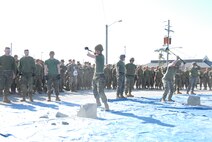 On March 15, 2018 Marine Corps Engineer School (MCES) hosted the annual St. Patrick’s Day Engineer Field Meet to pay homage to St. Patrick, the patron saint for engineers; build camaraderie amongst the engineer and utility communities, and compete for the Engineer Field Meet Trophy.  Marines competing in the Find the Rebar Challenge use sledge hammers to break apart a cement block in order to find a piece of rebar.