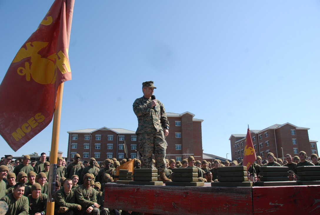 Colonel James H. Bain, MCES Commanding Officer, delivers closing remarks to the Marines before handing out the Engineer Field Meet Trophy and individual event trophies.  This year's overall Engineer Field Meet winner was 8th Engineer Support Battalion (8th ESB).