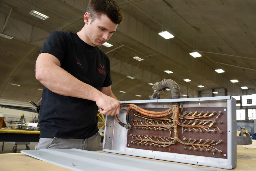 (02/22/2018) -- Museum restoration specialist Jason Davis works on bomb bay components for the Boeing B-17F Memphis Belle. Plans call for the aircraft to be placed on permanent public display in the WWII Gallery here at the National Museum of the U.S. Air Force on May 17, 2018. (U.S. Air Force photo by Ken LaRock)