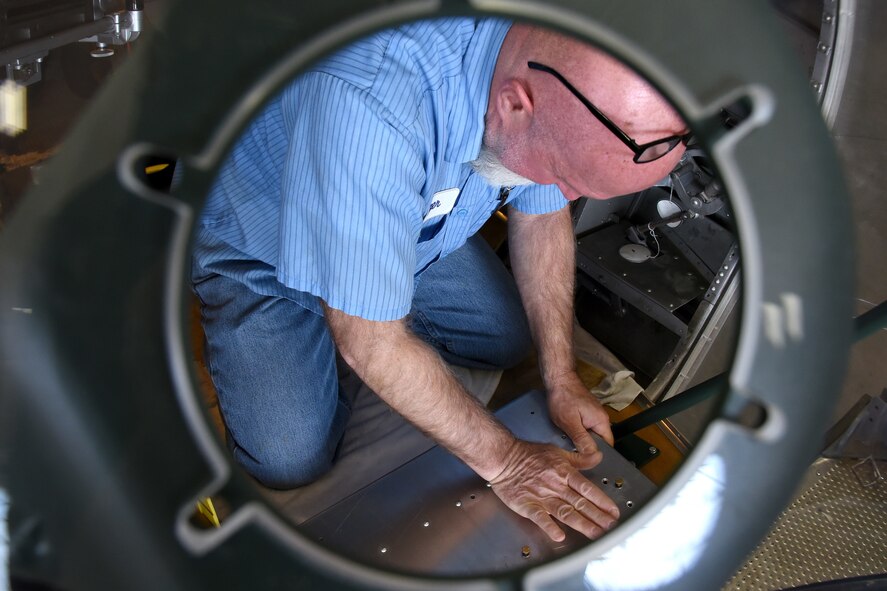 (02/26/2018) -- Museum restoration specialist Roger Brigner works on the bomb sight mount in the Boeing B-17F Memphis Belle. Plans call for the aircraft to be placed on permanent public display in the WWII Gallery here at the National Museum of the U.S. Air Force on May 17, 2018. (U.S. Air Force photo by Ken LaRock)