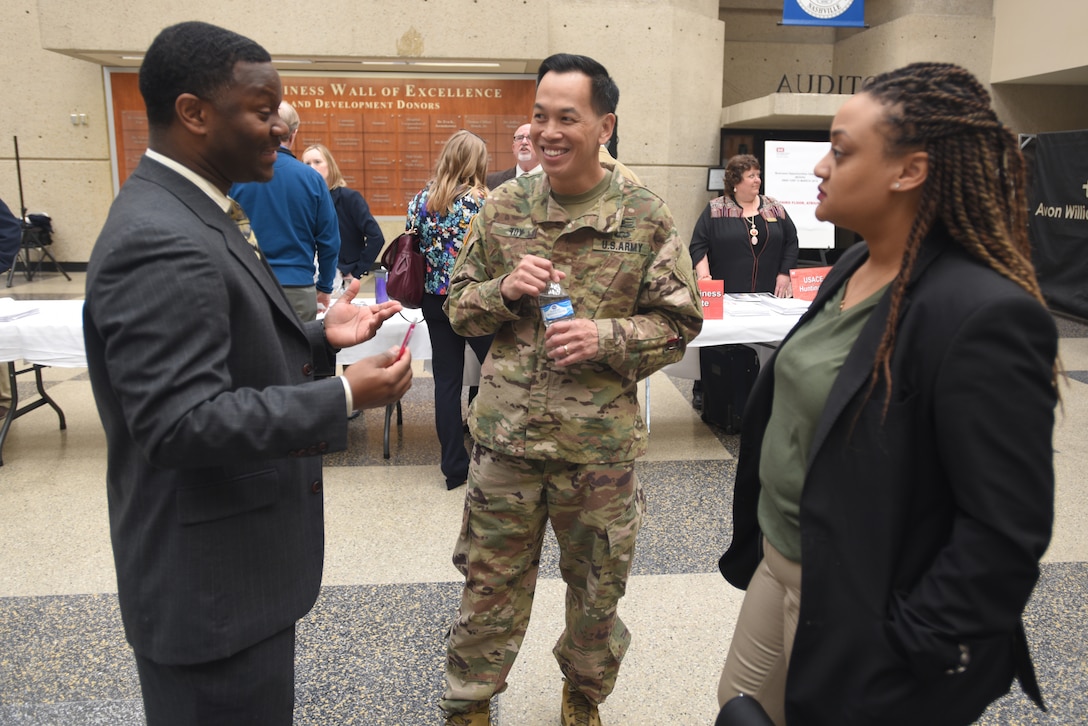 Brig. Gen. Mark Toy, U.S. Army Corps of Engineers Great Lakes and Ohio River Division commander, meets with Christopher Ballard, vice president of operations for Simms Building Group, and Endia Javon, administrative assistant and project administrator for Simms Building Group, during the Business Opportunities Open House, also known as "BOOH," at Tennessee State University in Nashville, Tenn., March 15, 2018. (USACE photo by Lee Roberts)