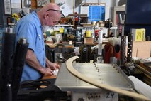 02/28/2018) -- Museum restoration specialist Roger Brigner works on the nose cone seal for the Boeing B-17F Memphis Belle. Plans call for the aircraft to be placed on permanent public display in the WWII Gallery here at the National Museum of the U.S. Air Force on May 17, 2018. (U.S. Air Force photo by Ken LaRock)