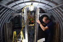 (03/01/2018) -- Museum restoration specialist Brian Lindamood works on the bomb racks of the Boeing B-17F Memphis Belle. Plans call for the aircraft to be placed on permanent public display in the WWII Gallery here at the National Museum of the U.S. Air Force on May 17, 2018. (U.S. Air Force photo by Ken LaRock)