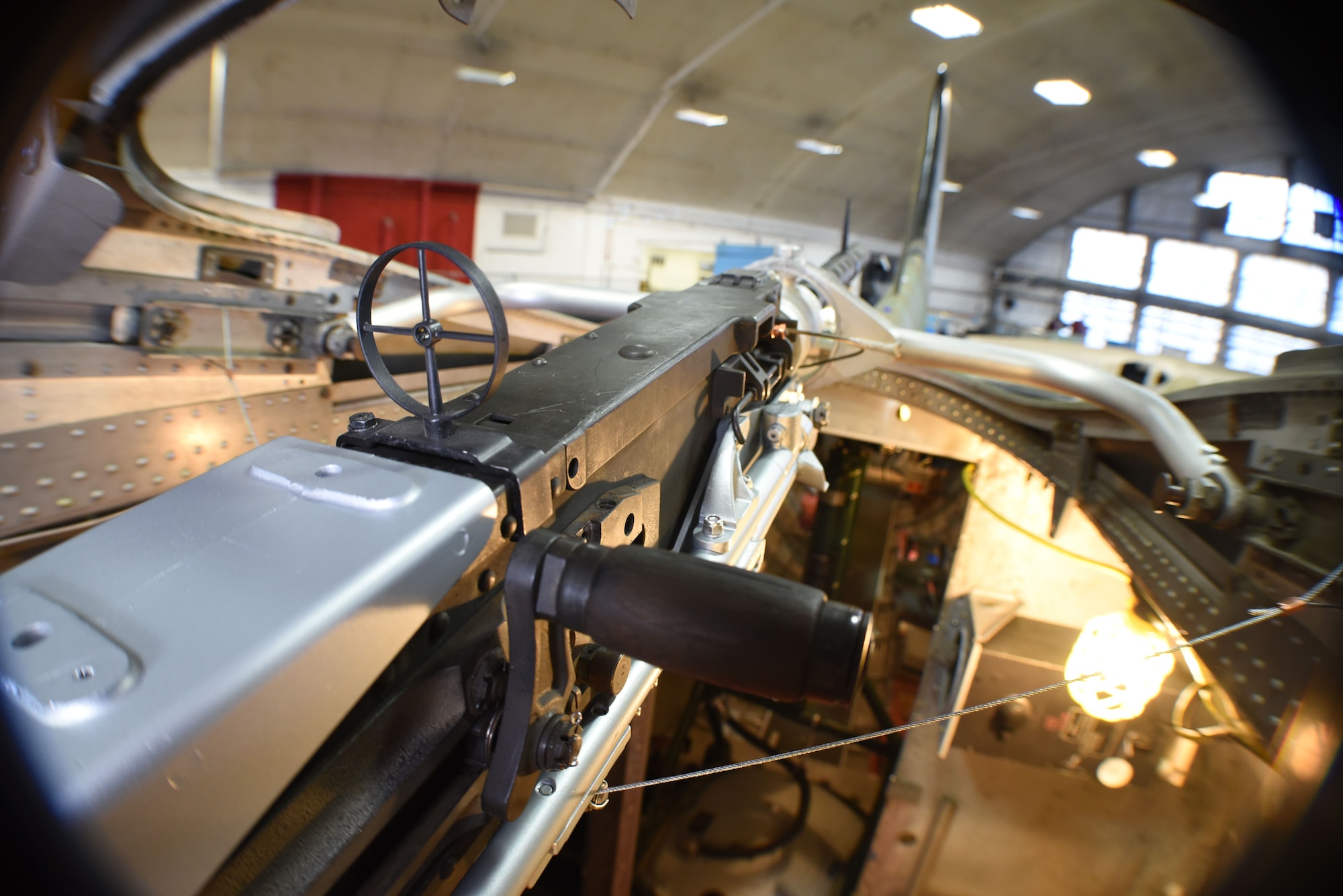 (03/01/2018) -- View of the .50 Caliber Machine Gun in the radio room of the Boeing B-17F Memphis Belle. Plans call for the aircraft to be placed on permanent public display in the WWII Gallery here at the National Museum of the U.S. Air Force on May 17, 2018. (U.S. Air Force photo by Ken LaRock)