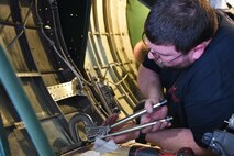 (03/01/2018) -- Museum restoration specialist Jeremy Gallogly works in the nose of the Boeing B-17F Memphis Belle. Plans call for the aircraft to be placed on permanent public display in the WWII Gallery here at the National Museum of the U.S. Air Force on May 17, 2018. (U.S. Air Force photo by Ken LaRock)