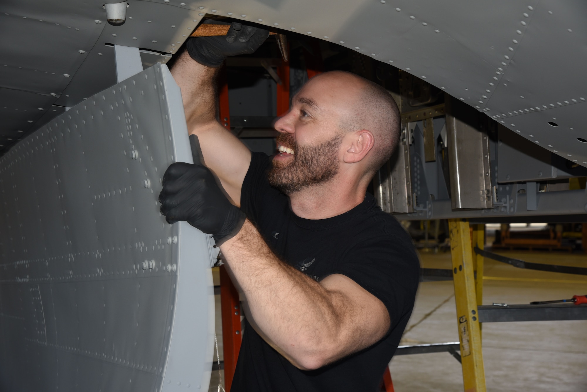 (03/06/2018) -- Museum restoration specialist Chase Meredith attaches bomb bay doors of the Boeing B-17F Memphis Belle. Plans call for the aircraft to be placed on permanent public display in the WWII Gallery here at the National Museum of the U.S. Air Force on May 17, 2018. (U.S. Air Force photo by Ken LaRock)