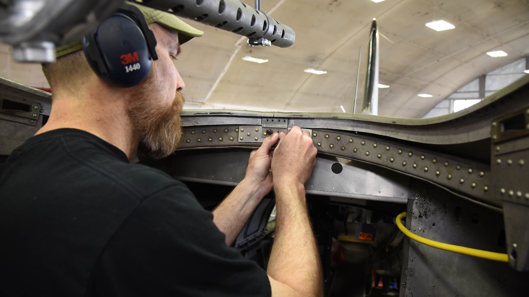 (03/07/2018) -- Museum restoration specialist Chad Vanhook works in the radio room of the Boeing B-17F Memphis Belle. Plans call for the aircraft to be placed on permanent public display in the WWII Gallery here at the National Museum of the U.S. Air Force on May 17, 2018. (U.S. Air Force photo by Ken LaRock)