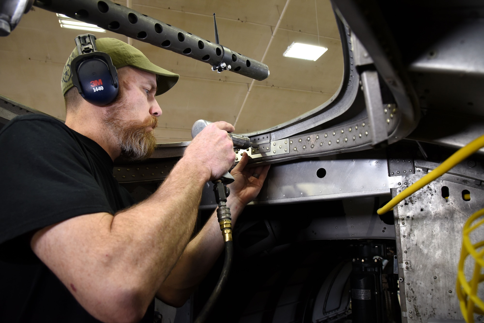 (03/07/2018) -- Museum restoration specialist Chad Vanhook works in the radio room of the Boeing B-17F Memphis Belle. Plans call for the aircraft to be placed on permanent public display in the WWII Gallery here at the National Museum of the U.S. Air Force on May 17, 2018. (U.S. Air Force photo by Ken LaRock)