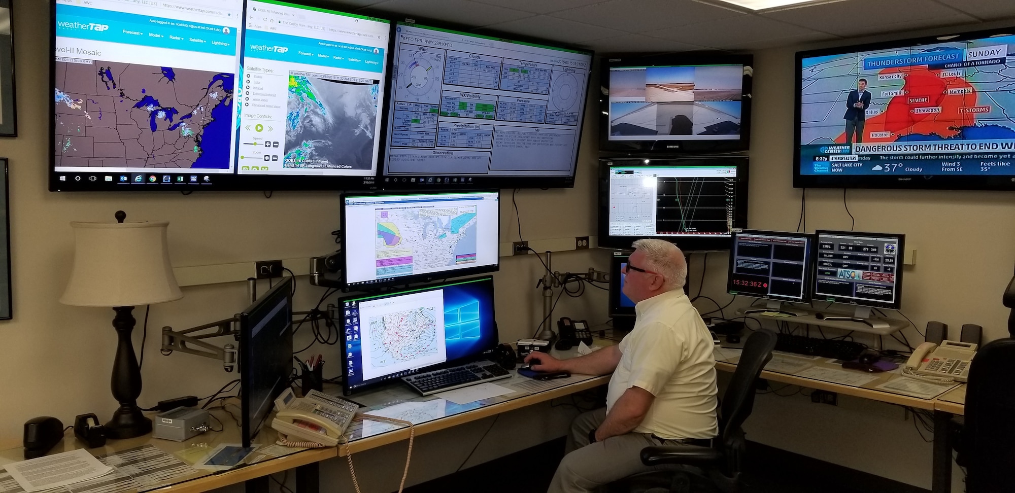 Philip Studler, Jr., operational meteorologist, 88th Support Squadron, tracks weather systems on a radar screen. (Courtesy photo)
