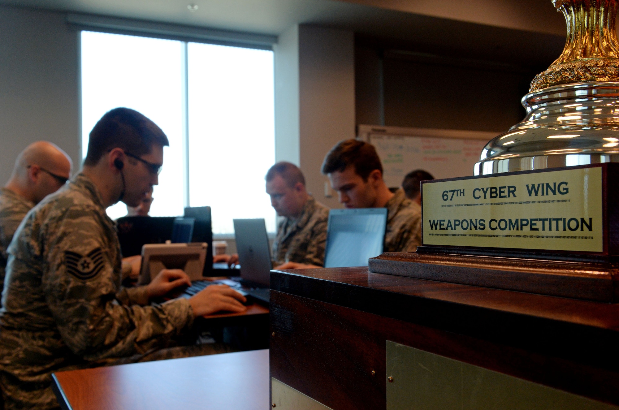 Cyberspace professionals from the 67th Cyberspace Wing compete in the annual weapons competition, March 7, 2018, in San Antonio, Texas. First, second and third place winners were named in individual, mixed team and unit categories. (U.S. Air Force photo by Tech. Sgt. R.J. Biermann)