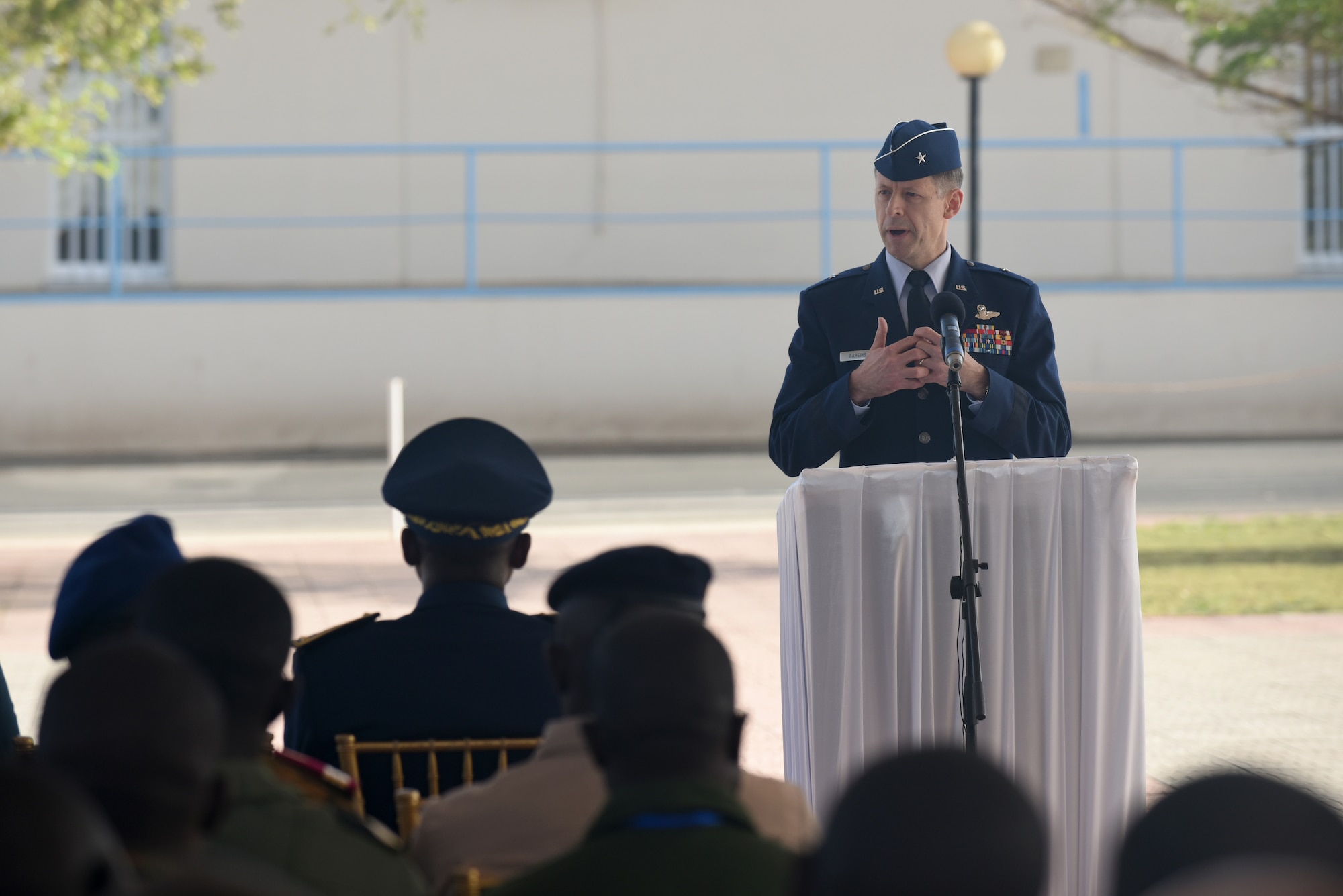 U.S. Air Force Brig. Gen. Dieter Bareihs, U.S. Air Forces in Africa director of plans, programs and analyses, speaks during the opening ceremony of African Partnership Flight Senegal at Captain Andalla Cissé Air Base, Senegal, March 19, 2018. The APF program is U.S. Air Forces in Africa’s premier security cooperation program with African partner nations to improve professional military aviation knowledge and skills. (U.S. Air Force photo by Airman 1st Class Eli Chevalier)